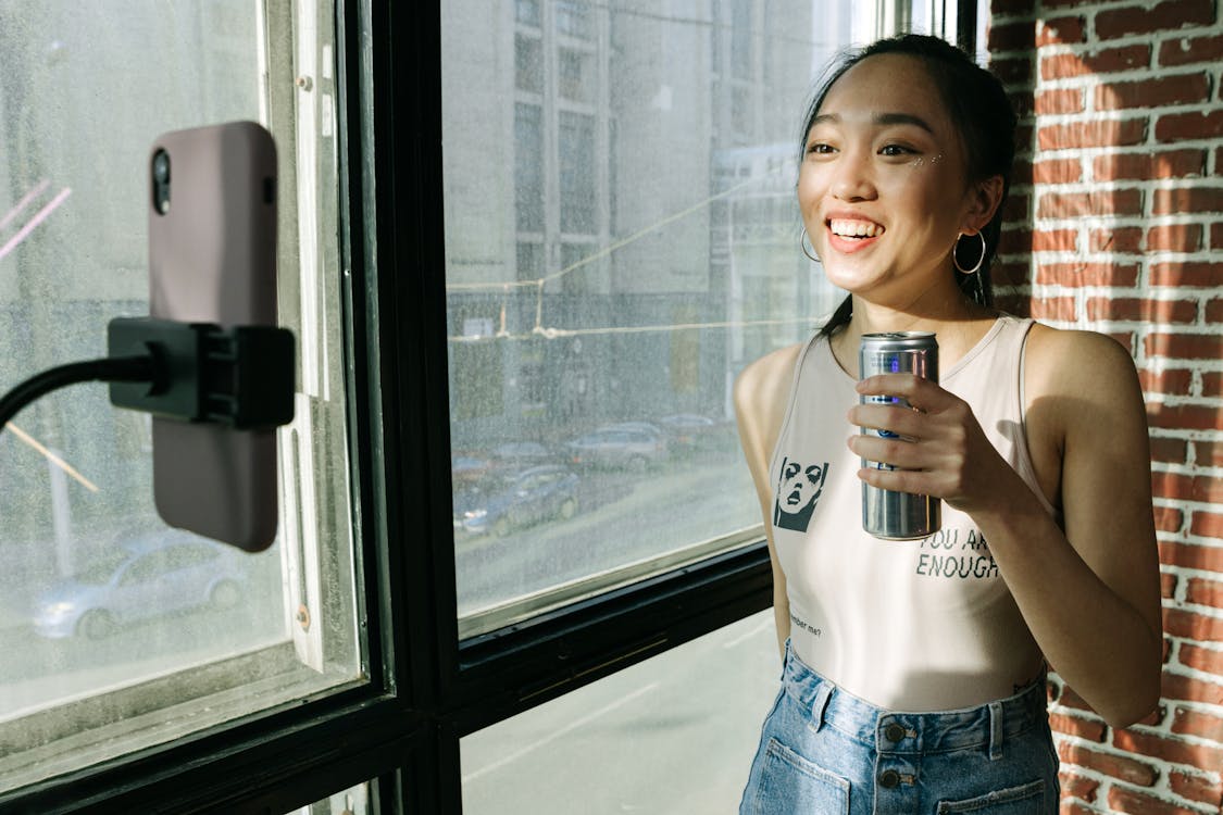 Influencer creating video outdoors